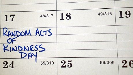 A calendar showing Feb 17 as Random Act of Kindness Day as part of the Paying It Forward movement